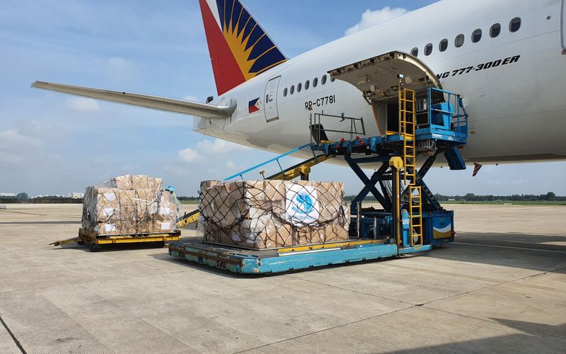 Cargo pallets being loaded onto a plane – air freight to Australia